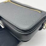 Metis East West Monogram Empreinte Noir