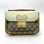 Padlock Slingbag GG Supreme Ivory Saffran