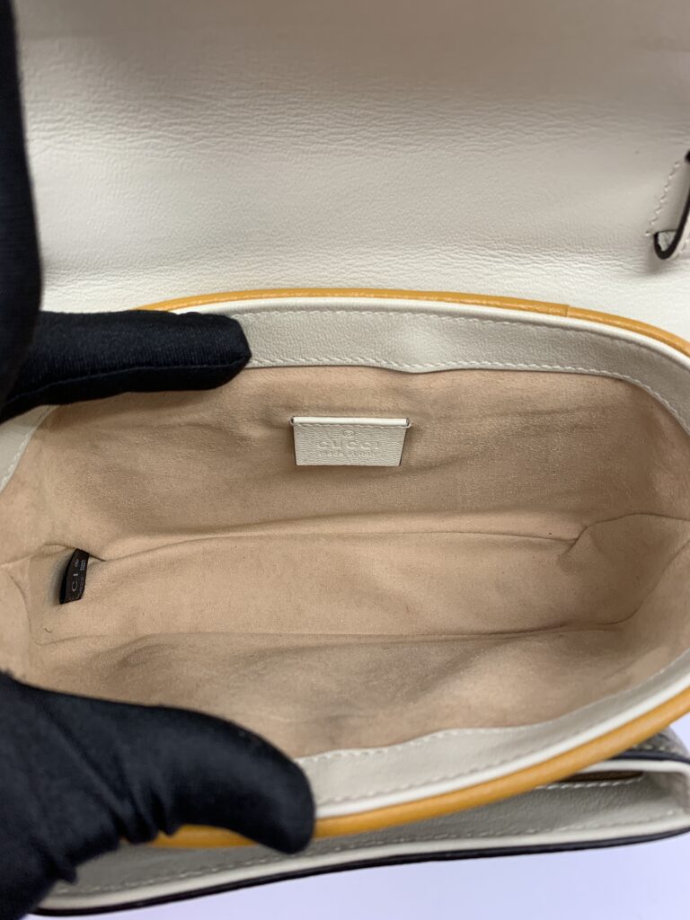 Padlock Slingbag GG Supreme Ivory Saffran