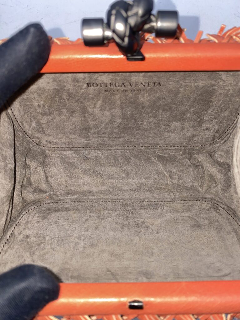 Fringe Knot Clutch Orange Coral