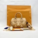 Speedy Bandou 20 Giant Monogram Empreinte Caramel