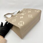 On The Go MM Monogram Empreinte Tourterelle Creme GHW