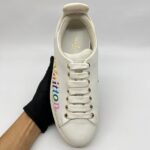 Timeout New Wave White Rainbow Logo