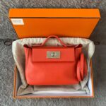 24/24 21 Evercolor/Swift Orange Field PHW