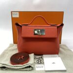 24/24 21 Evercolor/Swift Orange Field PHW