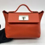 24/24 21 Evercolor/Swift Orange Field PHW