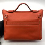 24/24 21 Evercolor/Swift Orange Field PHW