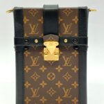 Trunk Vertical Monogram Noir Gold Hardware