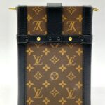 Trunk Vertical Monogram Noir Gold Hardware
