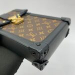 Trunk Vertical Monogram Noir Gold Hardware