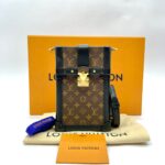 Trunk Vertical Monogram Noir Gold Hardware