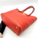 Citadine Monogram Empreinte Orient Coral GHW