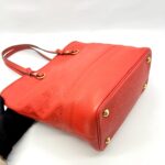 Citadine Monogram Empreinte Orient Coral GHW