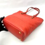 Citadine Monogram Empreinte Orient Coral GHW