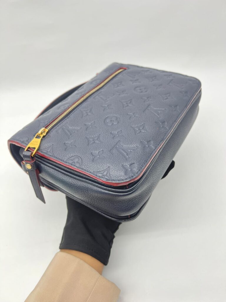 Metis MM Monogram Empreinte Marine Rouge GHW