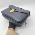 Metis MM Monogram Empreinte Marine Rouge GHW