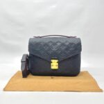 Metis MM Monogram Empreinte Marine Rouge GHW