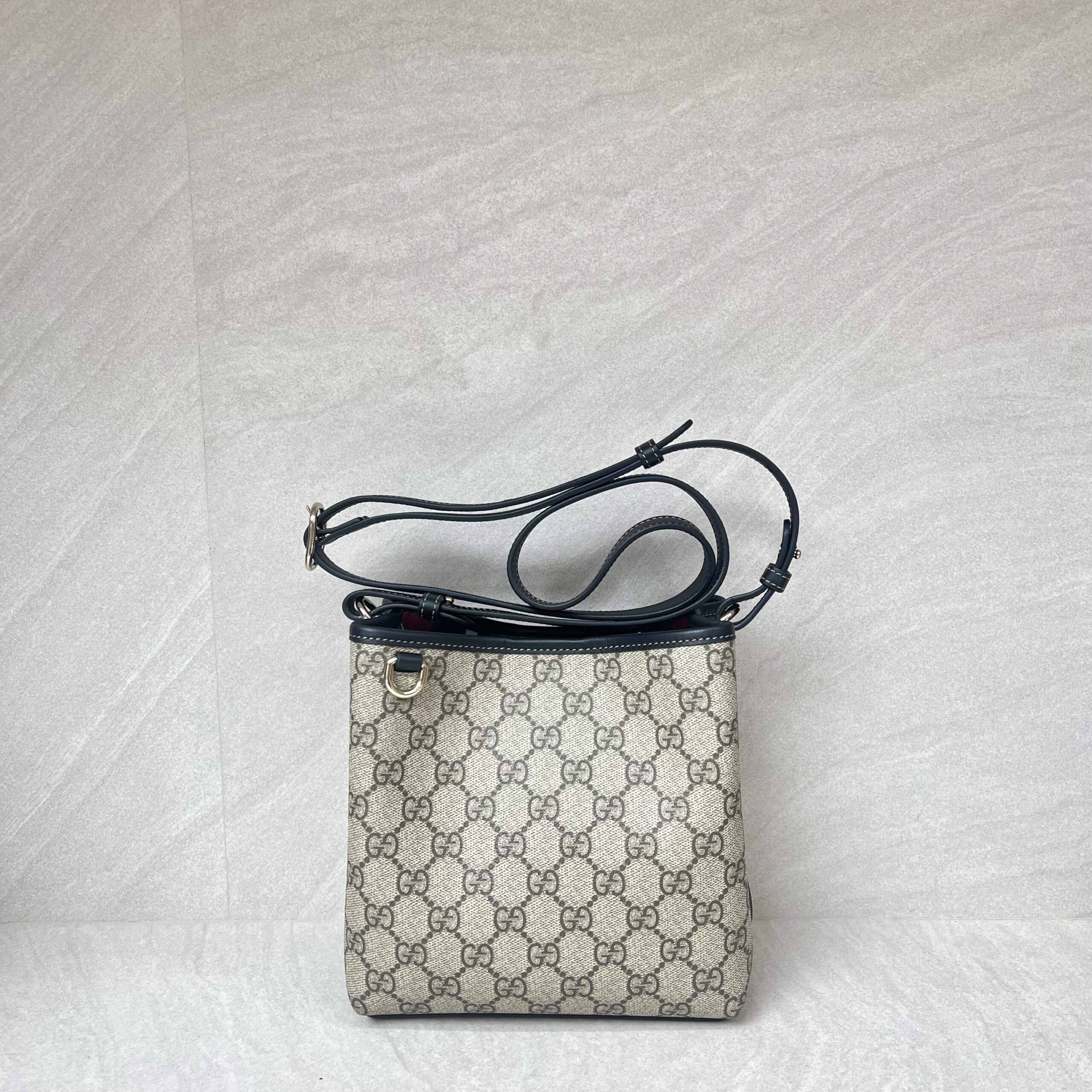 Gucci GG Emblem Small Bucket GG Supreme Black LGHW