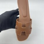 Hermes Oran Sandals Gold