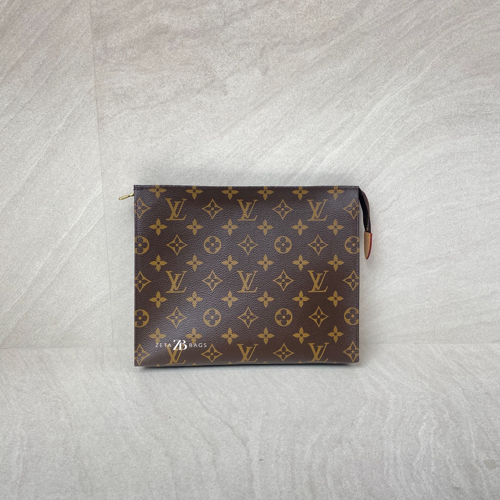 Louis Vuitton Pochette Toiletry Monogram GHW
