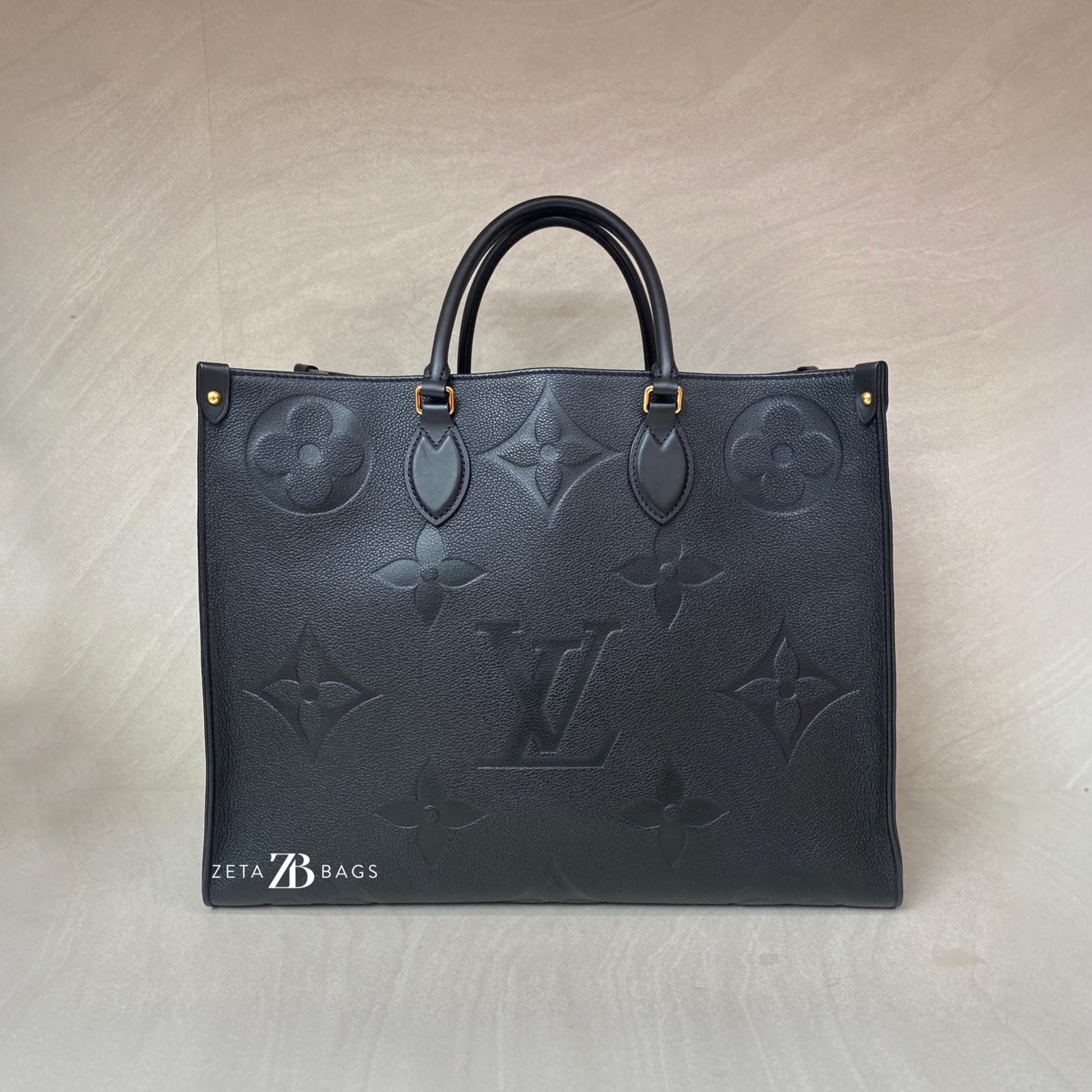 Louis Vuitton On The Go GM Monogram Empreiente Giant Noir GHW
