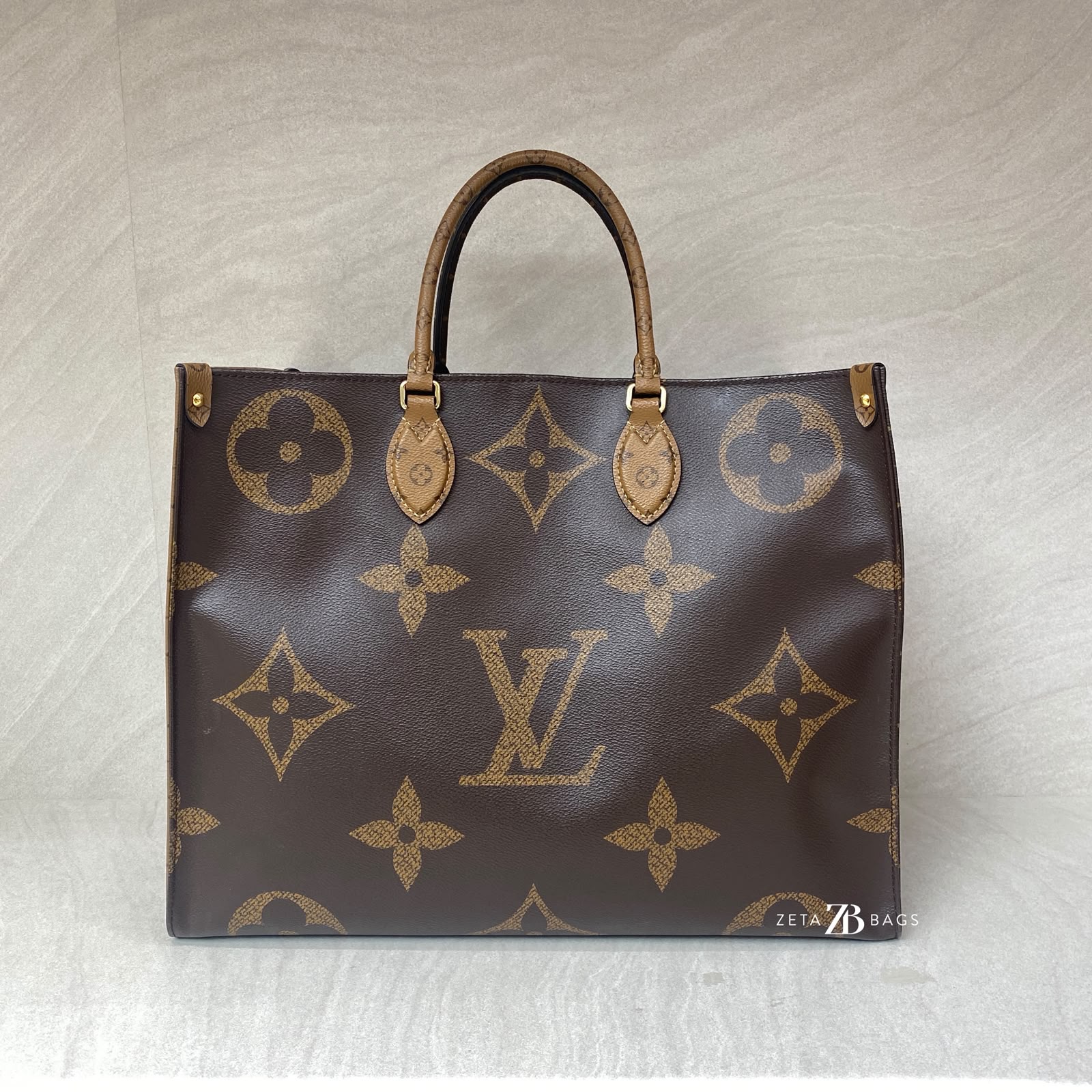 Louis Vuitton On The Go MM Giant Monogram Reverse GHW