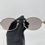 Prada Sunglasses SPR65Z Gold Noir