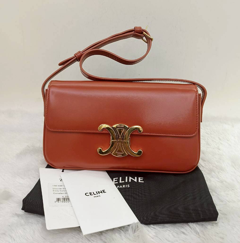 Celine Triomphe East West Calfskin Cornelian GHW