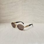 Prada Sunglasses SPR65Z Gold Noir